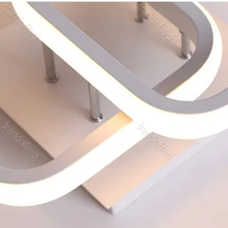 aplica-led-alba-cu-design-geometric-si-lumina-reglabila