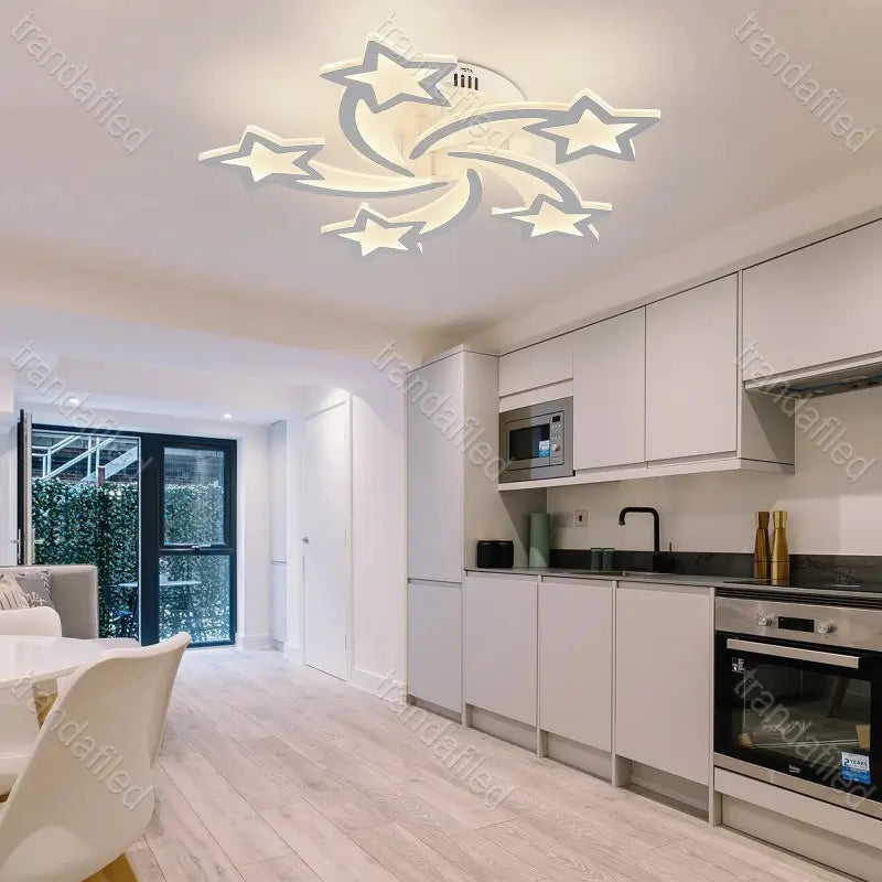 lustra-de-tavan-cu-forma-de-stele-si-lumina-led-alb-cald-design-modern-decor-camera
