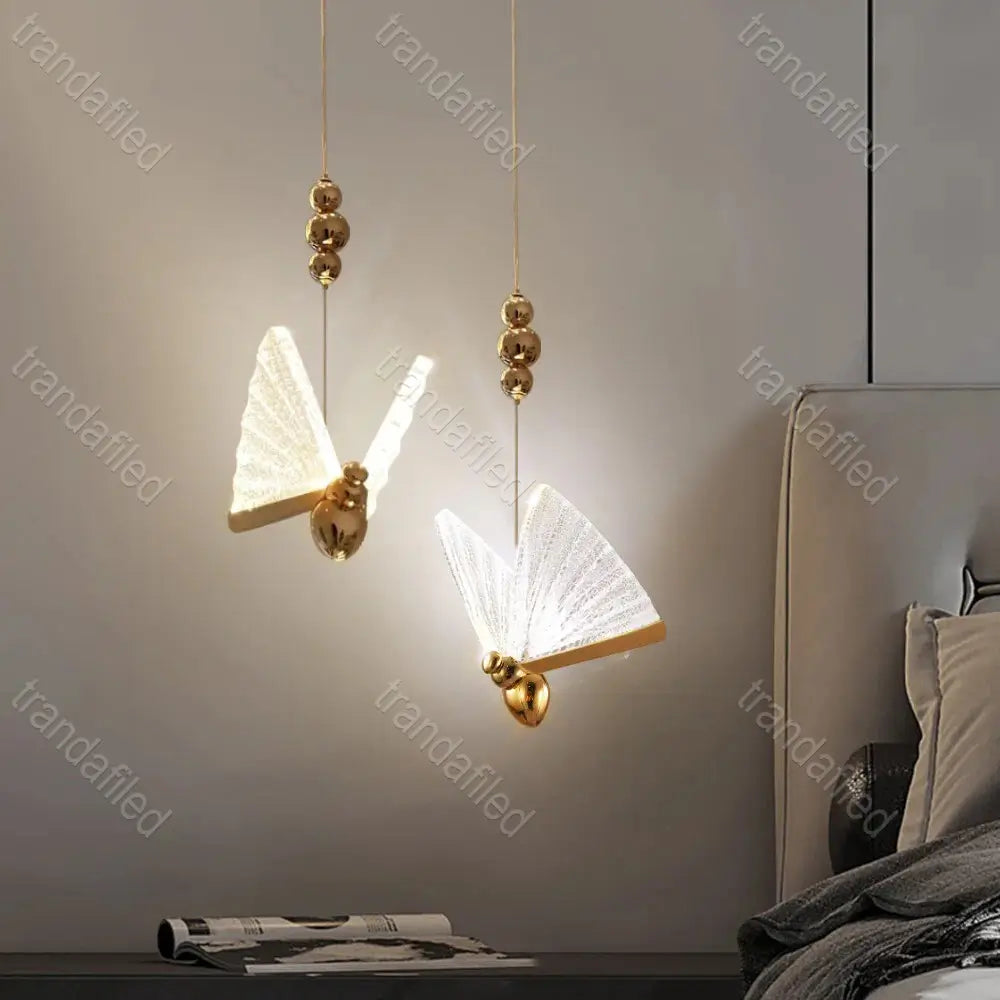 lustra-suspendata-led-cu-3-capete-fluture-aurie-eleganta