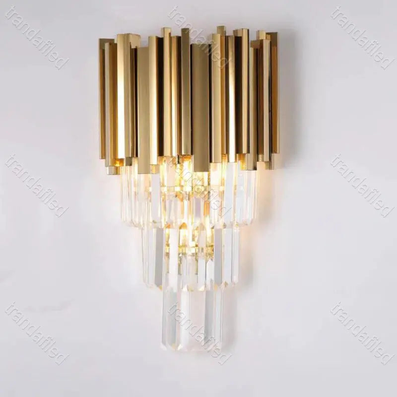 gold-and-crystal-wall-sconce-light-turned-on-mounted-on-wall-warm-ambient-lighting-for-bedroom-hallway-living-room