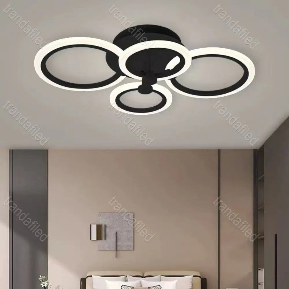 lustra-led-neagra-cu-4-brate-cercuri-moderne-pentru-living-sau-dormitor