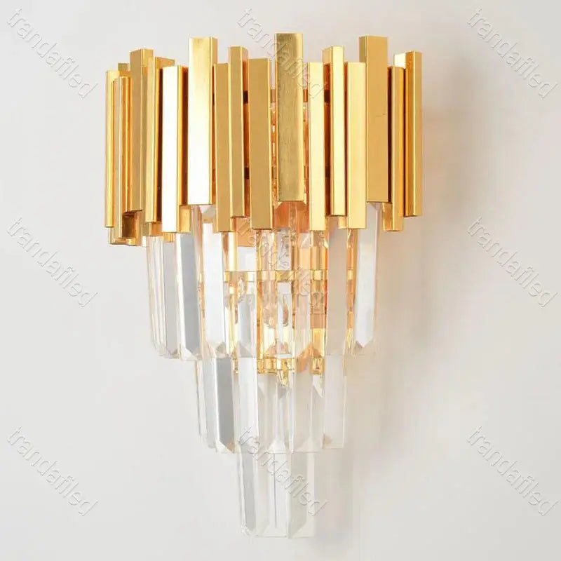 gold-and-crystal-wall-sconce-light-turned-on-mounted-on-wall-warm-ambient-lighting-for-bedroom-hallway-living-room