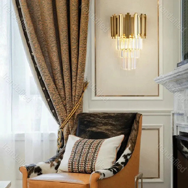 gold-and-crystal-wall-sconce-light-turned-on-mounted-on-wall-warm-ambient-lighting-for-bedroom-hallway-living-room